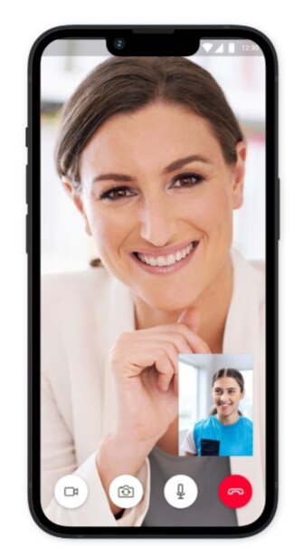 Screen of myPhonak Junior app. A smartphone screen showing a video call in progress. The main video feed shows a person resting their chin on their hand.