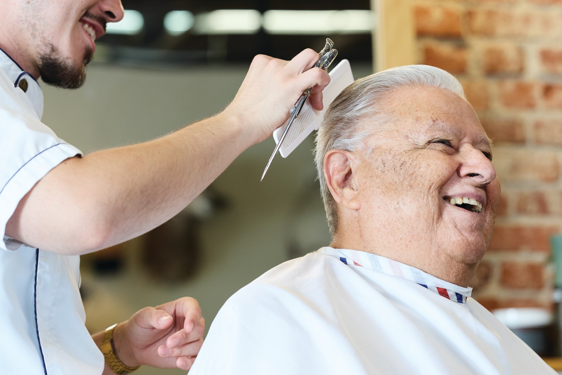 Veteran getting his hair cut at the barbershop